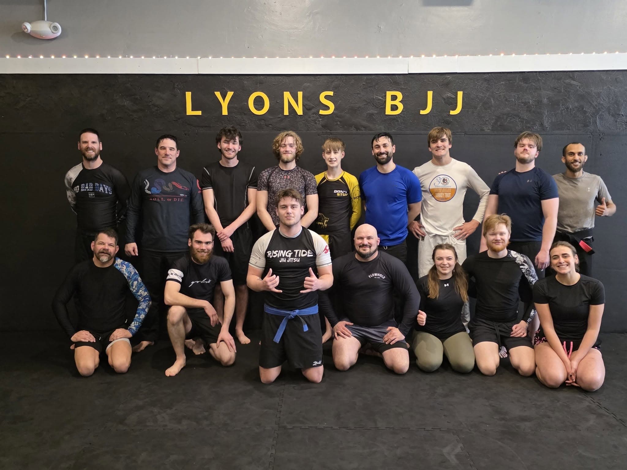 Lyons BJJ gym interior with a lounge overlooking the mats